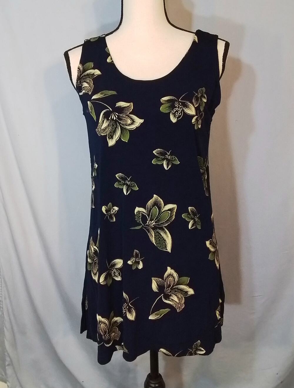 Jostar; Navy sleeveless tunic with green and badge flowers